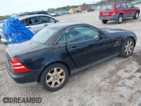1999 Mercedes-Benz SLK 230/320 with VIN WDBKK47F0XF086064, listed as a IAAI auction lot 42223522 with 166,381 mi miles and . Bid and sale history available at DreamBid. Image 4.