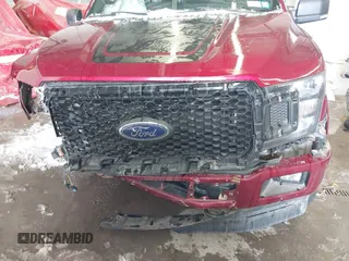 2019 Ford F-150 XL with VIN 1FTEW1EP4KFC74737, listed as a IAAI auction lot 41372054 with 76,916 mi miles and . Bid and sale history available at DreamBid. Image 13.