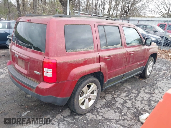 2013 Jeep Patriot Latitude with VIN 1C4NJPFA3DD237804, listed as a IAAI auction lot 41876591 with 73,852 mi miles. Bid and sale history available at carsss.com. Image 4.