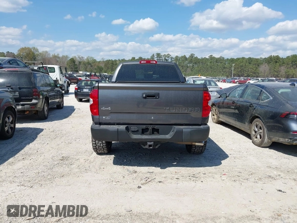 2014 Toyota Tundra 4WD Truck SR with VIN 5TFUM5F11EX055025, listed as a IAAI auction lot 41883017 with 100,565 mi miles. Bid and sale history available at carsss.com. Image 16.