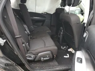 2019 Dodge Journey SE z VIN 3C4PDCBB1KT719203, wystawiony jako Copart lot #86170744 z przebiegiem Nie podano mil oraz Szkoda całkowita • Salvage title. Historia ofert i sprzedaży dostępna na DreamBid. Obrazek 11.
