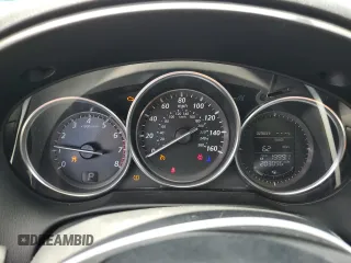 2014 Mazda CX-5 Sport z VIN JM3KE2BE8E0421316, wystawiony jako Copart lot #56548005 z przebiegiem 203 096 mil mil oraz Szkoda całkowita • Salvage title. Historia ofert i sprzedaży dostępna na DreamBid. Obrazek 9.