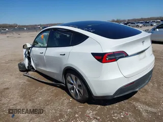 2021 Tesla Model Y Long Range with VIN 5YJYGDEE0MF106255, listed as a IAAI auction lot 41736610 with Not Provided miles. Bid and sale history available at carsss.com. Image 3.