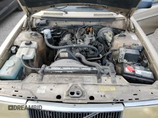 1993 Volvo 240 z VIN YV1AW8808P1945301, wystawiony jako Copart lot #76269044 z przebiegiem 121 083 mil mil oraz Nie do naprawy. Historia ofert i sprzedaży dostępna na DreamBid. Obrazek 12.