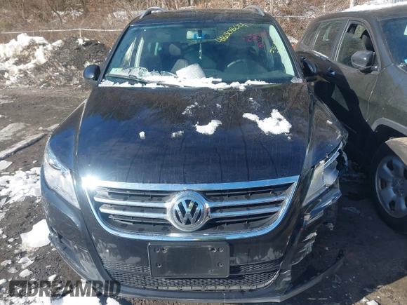 2011 Volkswagen Tiguan SE with VIN WVGBV7AXXBW511550, listed as a IAAI auction lot 41630804 with 99,967 mi miles and . Bid and sale history available at DreamBid. Image 12.