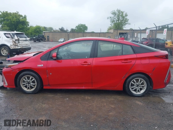 2021 Toyota Prius LE with VIN JTDKAMFP7M3178008, listed as a IAAI auction lot 42273697 with 110,605 mi miles and . Bid and sale history available at DreamBid. Image 14.