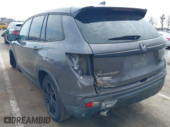 2019 Honda Passport Sport with VIN 5FNYF8H22KB012323, listed as a IAAI auction lot 41880476 with 153,341 mi miles and . Bid and sale history available at carsss.com. Image 3.