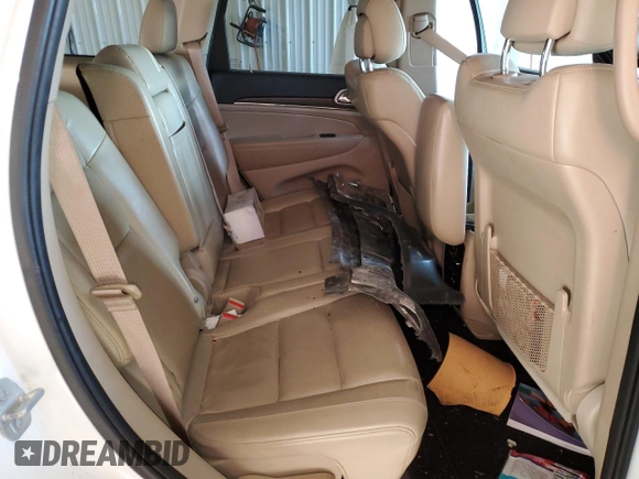 2020 Jeep Grand Cherokee Limited z VIN 1C4RJFBG2LC243295, wystawiony jako Copart lot #87415694 z przebiegiem 46 837 mil mil oraz Szkoda całkowita • Salvage title. Historia ofert i sprzedaży dostępna na DreamBid. Obrazek 11.