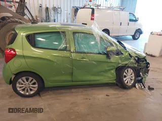 2016 Chevrolet Spark LT with VIN KL8CD6SA8GC618369, listed as a IAAI auction lot 41894815 with 94,317 mi miles and . Bid and sale history available at DreamBid. Image 13.