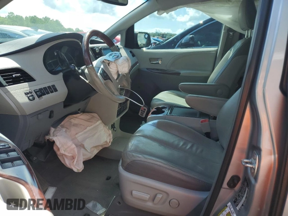 2013 Toyota Sienna XLE AAS with VIN 5TDYK3DC1DS318277, listed as a Copart auction lot 54156935 with 218,564 mi miles and Salvage title. Bid and sale history available at DreamBid. Image 7.