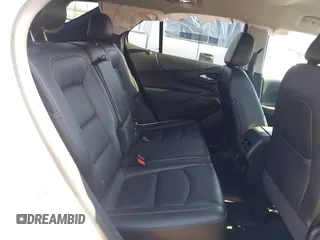2021 Chevrolet Equinox Premier z VIN 2GNAXNEV9M6120241, wystawiony jako IAAI lot #42222928 z przebiegiem 104 274 mil mil oraz . Historia ofert i sprzedaży dostępna na DreamBid. Obrazek 8.