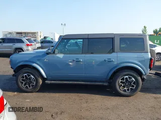 2024 Ford Bronco Outer Banks z VIN 1FMDE8BH3RLB41205, wystawiony jako IAAI lot #42558633 z przebiegiem 1 457 mil mil oraz . Historia ofert i sprzedaży dostępna na DreamBid. Obrazek 14.