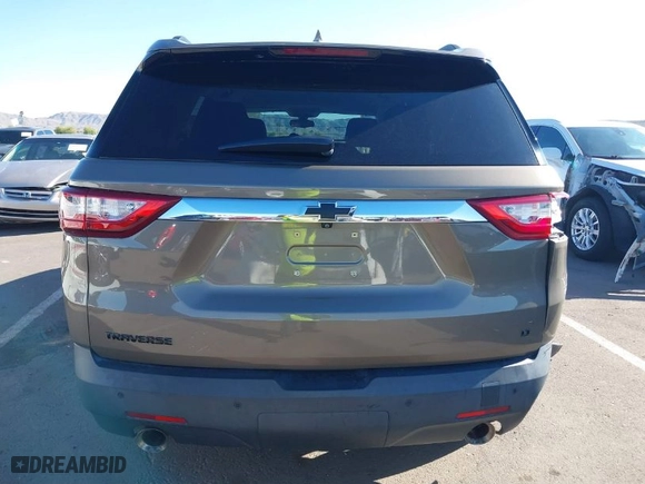 2020 Chevrolet Traverse LT Cloth with VIN 1GNERGKW7LJ112127, listed as a IAAI auction lot 41836681 with 98,575 mi miles. Bid and sale history available at carsss.com. Image 16.