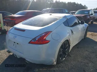 2015 Nissan 370Z Sport with VIN JN1AZ4EH0FM440627, listed as a IAAI auction lot 41410844 with 99,420 mi miles. Bid and sale history available at carsss.com. Image 4.