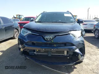 2018 Toyota RAV4 XLE with VIN JTMWFREV7JJ186925, listed as a IAAI auction lot 41717611 with 79,580 mi miles. Bid and sale history available at carsss.com. Image 12.