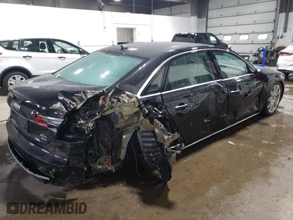 2015 Audi A8 4.0T z VIN WAU32AFD0FN017865, wystawiony jako Copart lot #37065594 z przebiegiem 55 632 mil mil oraz Szkoda całkowita • Salvage title. Historia ofert i sprzedaży dostępna na DreamBid. Obrazek 3.