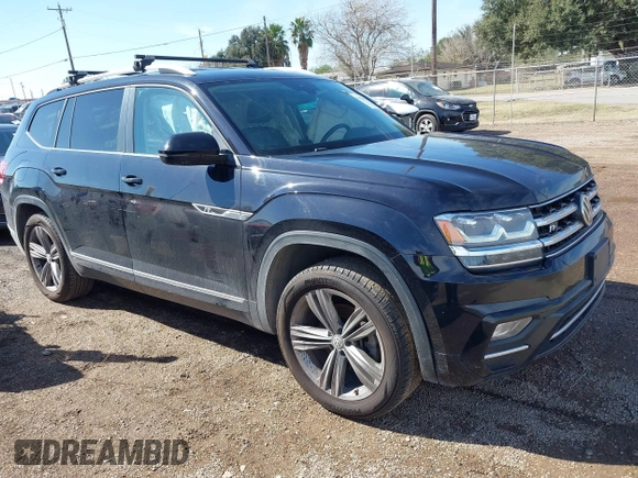 2018 Volkswagen Atlas SE with VIN 1V2FR2CA9JC537903, listed as a IAAI auction lot 41386874 with 118,764 mi miles and . Bid and sale history available at DreamBid. Image 1.