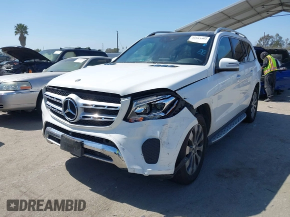 2018 Mercedes-Benz GLS 450 with VIN 4JGDF6EE6JB132415, listed as a IAAI auction lot 42283484 with 54,090 mi miles and . Bid and sale history available at DreamBid. Image 2.