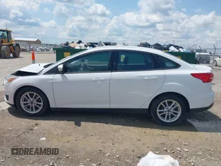 2016 Ford Focus SE z VIN 1FADP3F29GL346196, wystawiony jako IAAI lot #42171014 z przebiegiem 80 913 mil mil oraz . Historia ofert i sprzedaży dostępna na DreamBid. Obrazek 14.