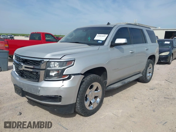 2015 Chevrolet Tahoe LT with VIN 1GNSCBKC9FR111984, listed as a IAAI auction lot 42003685 with 186,391 mi miles and . Bid and sale history available at DreamBid. Image 18.