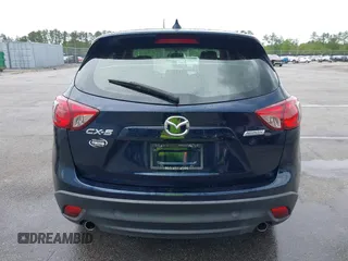 2016 Mazda CX-5 Sport with VIN JM3KE2BY0G0850298, listed as a IAAI auction lot 42107007 with 97,478 mi miles. Bid and sale history available at carsss.com. Image 16.