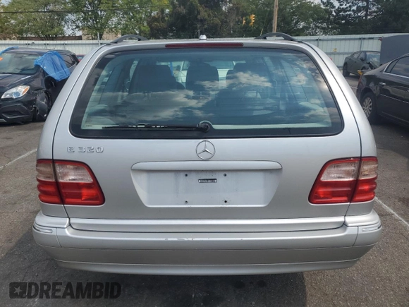 2001 Mercedes-Benz E-Class with VIN WDBJH65J41B201471, listed as a Copart auction lot 68863194 with 106,893 mi miles and Salvage Title. Bid and sale history available at carsss.com. Image 6.