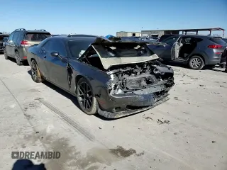 2016 Dodge Challenger 392 Hemi Scat Pack Shaker z VIN 2C3CDZFJ8GH279147, wystawiony jako Copart lot #41882095 z przebiegiem 98 874 mil mil oraz Szkoda całkowita • Salvage title. Historia ofert i sprzedaży dostępna na DreamBid. Obrazek 10.