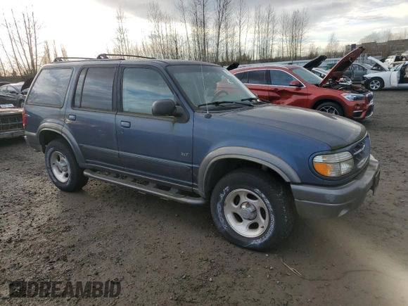 1999 Ford Explorer XL with VIN 1FMDU32E7XUC25465, listed as a Copart auction lot 83651354 with 93,850 mi miles and Clean title. Bid and sale history available at DreamBid. Image 4.