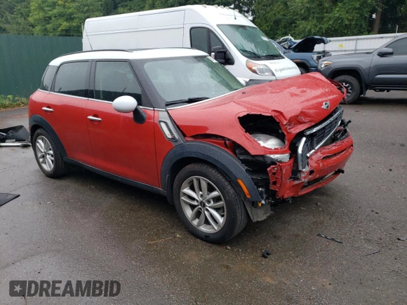 2014 MINI Countryman S with VIN WMWZC3C52EWP25379, listed as a Copart auction lot 61438355 with 76,943 mi miles and Salvage title. Bid and sale history available at DreamBid. Image 4.