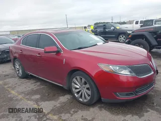 2014 Lincoln MKS with VIN 1LNHL9DK1EG605472, listed as a IAAI auction lot 41305128 with 116,747 mi miles. Bid and sale history available at carsss.com. Image 1.