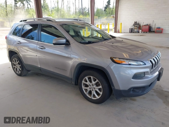 2018 Jeep Cherokee Latitude Plus z VIN 1C4PJLLB9JD573435, wystawiony jako IAAI lot #42163796 z przebiegiem 57 486 mil mil oraz . Historia ofert i sprzedaży dostępna na DreamBid. Obrazek 1.
