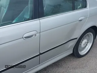 2000 BMW 5 Series 528iA with VIN WBADM6344YGU22084, listed as a IAAI auction lot 41734099 with 249,650 mi miles. Bid and sale history available at carsss.com. Image 6.