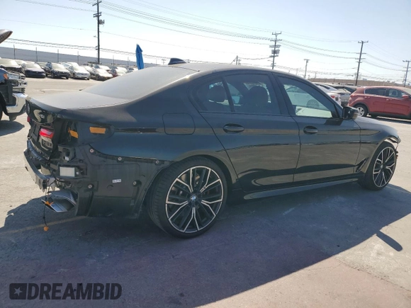 2021 BMW 5 Series 540i with VIN WBA53BJ05MWW92487, listed as a Copart auction lot 57679975 with 53,311 mi miles and Salvage title. Bid and sale history available at DreamBid. Image 3.