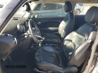 2013 MINI Hardtop S with VIN WMWSV3C52DT393181, listed as a Copart auction lot 50179065 with 66,655 mi miles and Salvage Title. Bid and sale history available at DreamBid. Image 7.