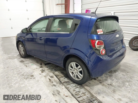 2013 Chevrolet Sonic LT with VIN 1G1JC6SB9D4252785, listed as a IAAI auction lot 41499502 with 114,924 mi miles. Bid and sale history available at carsss.com. Image 3.