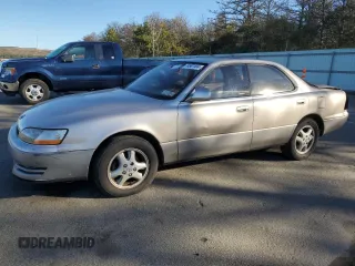 1995 Lexus ES 300 с VIN JT8GK13TXS0121401, выставлен на аукционе Copart как лот 74987404 с пробегом 90 900 миль миль и Списание • Salvage title. История ставок и продаж доступна на DreamBid. Изображение 1.