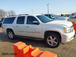 2011 Chevrolet Suburban LTZ with VIN 1GNSCKE02BR317269, listed as a IAAI auction lot 41446893 with 304,318 mi miles. Bid and sale history available at carsss.com. Image 13.