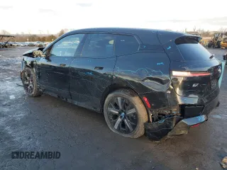 2025 BMW iX xDrive50 with VIN WB523CF0XSCT63136, listed as a Copart auction lot 44538265 with 230 mi miles and Salvage Title. Bid and sale history available at carsss.com. Image 2.