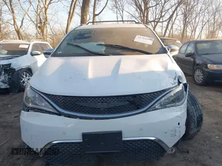 2017 Chrysler Pacifica Limited with VIN 2C4RC1GG4HR500560, listed as a IAAI auction lot 41764809 with 92,817 mi miles and . Bid and sale history available at DreamBid. Image 12.