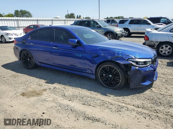2018 BMW M5 z VIN WBSJF0C51JB282030, wystawiony jako Copart lot #54773835 z przebiegiem 44 046 mil mil oraz Szkody całkowita. Historia ofert i sprzedaży dostępna na DreamBid. Obrazek 4.