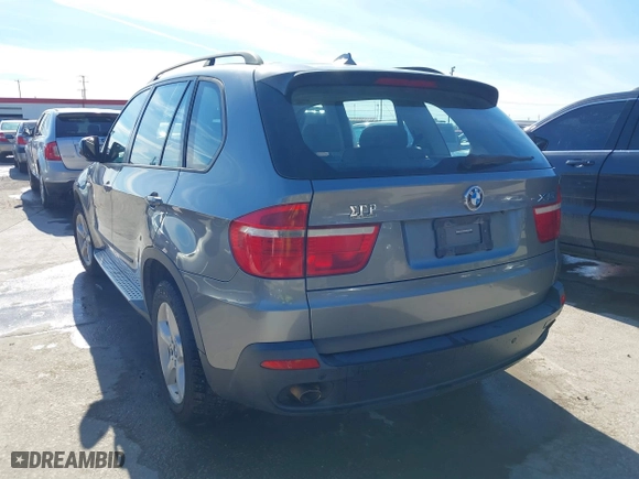 2007 BMW X5 3.0si with VIN 5UXFE43577L014625, listed as a IAAI auction lot 41325492 with 200,769 mi miles. Bid and sale history available at carsss.com. Image 3.