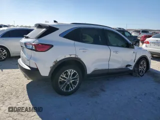 2021 Ford Escape SEL Hybrid z VIN 1FMCU0CZ5MUA52570, wystawiony jako Copart lot #42097635 z przebiegiem 105 059 mil mil oraz Czysty tytuł • Clean title. Historia ofert i sprzedaży dostępna na DreamBid. Obrazek 3.