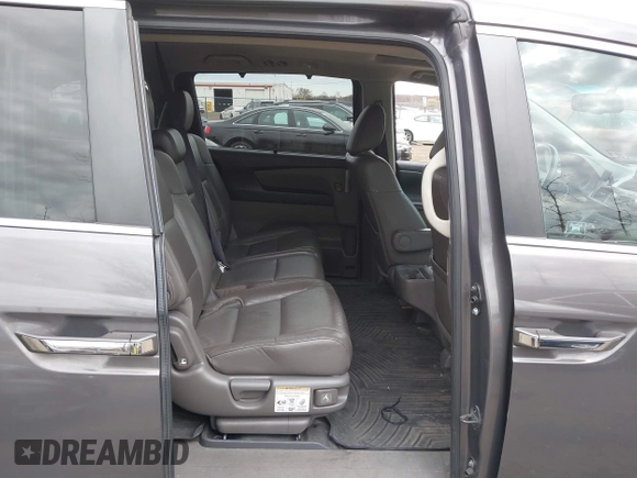 2012 Honda Odyssey EX-L with VIN 5FNRL5H65CB042898, listed as a IAAI auction lot 41784075 with 179,596 mi miles and . Bid and sale history available at carsss.com. Image 8.