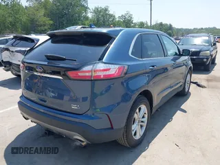 2019 Ford Edge SEL with VIN 2FMPK4J95KBB47327, listed as a IAAI auction lot 42765430 with 97,129 mi miles and . Bid and sale history available at DreamBid. Image 4.