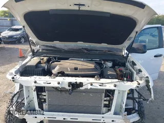 2021 Chevrolet Colorado 4WD Z71 with VIN 1GCGTDEN6M1166282, listed as a IAAI auction lot 40316921 with 35,515 mi miles and . Bid and sale history available at DreamBid. Image 10.