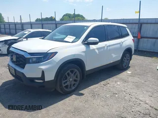 2023 Honda Passport EX-L z VIN 5FNYF8H57PB006499, wystawiony jako IAAI lot #42036371 z przebiegiem 51 404 mil mil oraz . Historia ofert i sprzedaży dostępna na DreamBid. Obrazek 2.