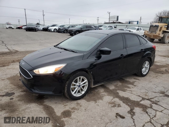 2018 Ford Focus SE with VIN 1FADP3FE9JL244270, listed as a Copart auction lot 44072385 with 111,749 mi miles and Salvage Title. Bid and sale history available at DreamBid. Image 1.