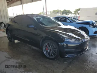 2021 Tesla Model 3 Standard Range Plus with VIN 5YJ3E1EA2MF048564, listed as a Copart auction lot 88754285 with 57,894 mi miles and Non Repairable. Bid and sale history available at DreamBid. Image 4.