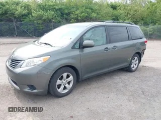 2014 Toyota Sienna LE AAS with VIN 5TDKK3DC8ES432364, listed as a IAAI auction lot 42081378 with 187,131 mi miles and . Bid and sale history available at DreamBid. Image 2.