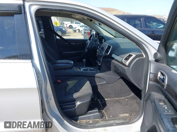 2013 Jeep Grand Cherokee Laredo with VIN 1C4RJFAG5DC634685, listed as a IAAI auction lot 41792147 with 260,594 mi miles. Bid and sale history available at carsss.com. Image 5.